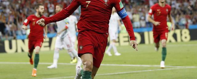 Portugal's Cristiano Ronaldo celebrates his side's opening goal during a Group B match against Spain.